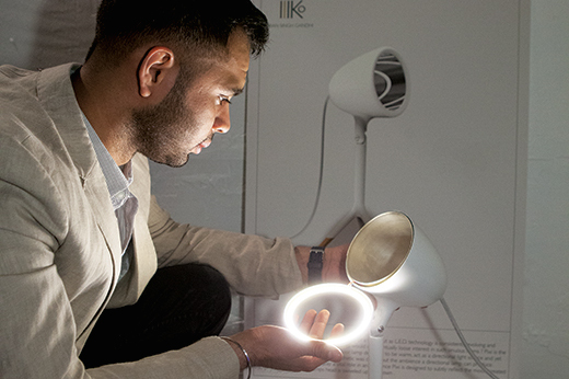 Environmental Design graduate student Kanan Singh Gandhi with a lighting project he created in the Furniture and Fixtures track.