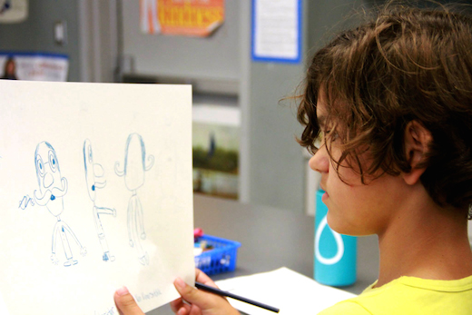 A Blair High School Art Club student works on a character turnaround.